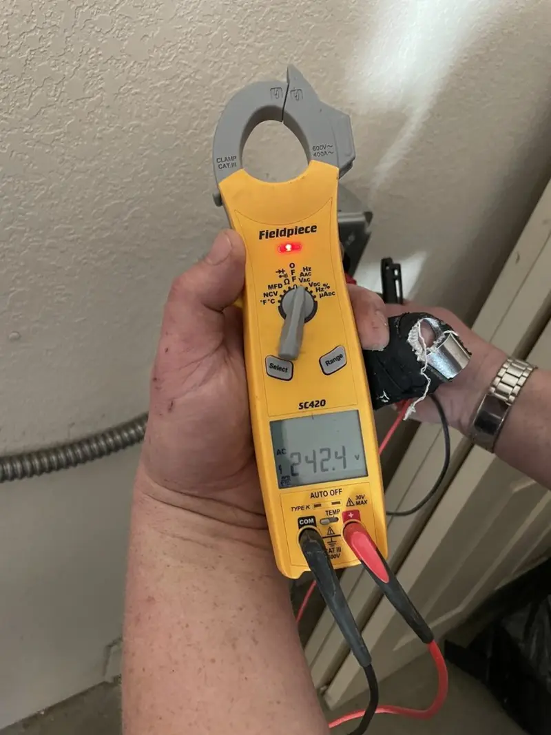 Voltage testing with clamp meter during Electrical Installation Services in La Mirada